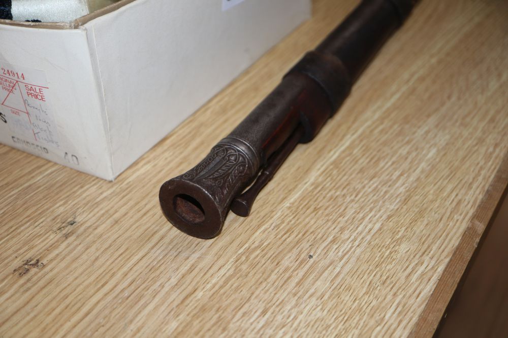 A 19th century percussion cap musket and an Eastern musket